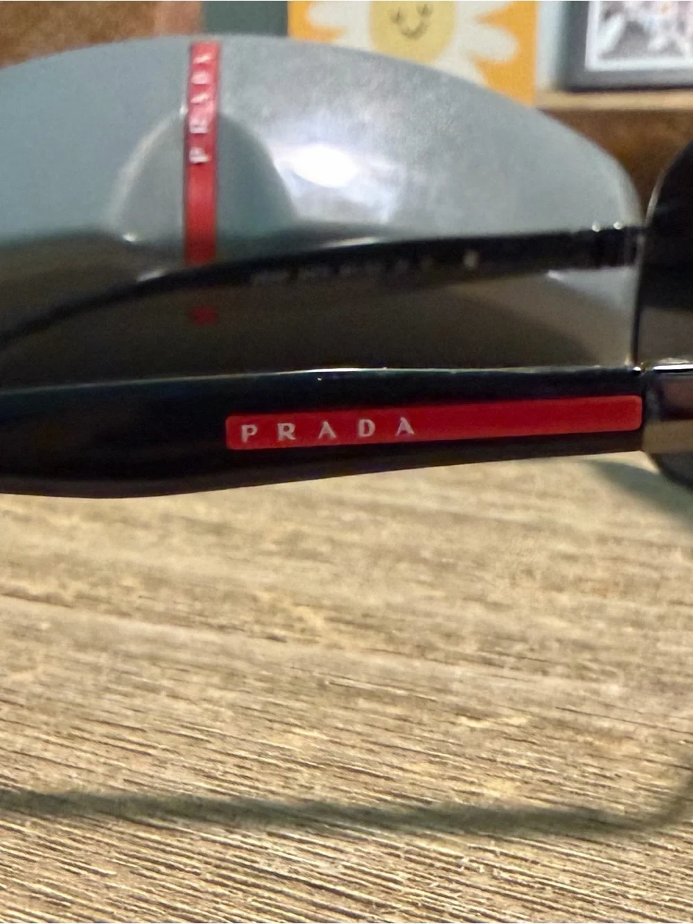 Prada Black Aviator Sunglasses with Gray Case and Red Logo